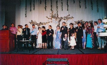 toasting on stage at wedding banquet